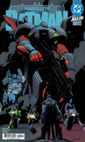 Comic book cover featuring a large robot-like figure with 'Absolute Batman' text and DC logo.