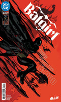 Comic book cover featuring a silhouette of a character with a bat emblem on a red background