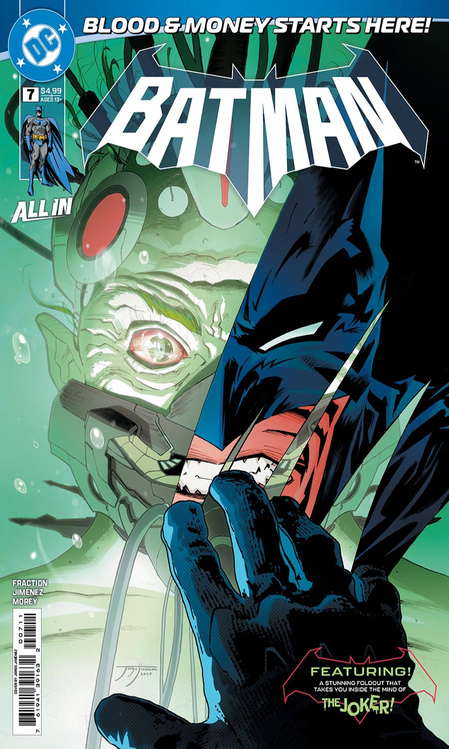 Comic book cover featuring Batman and a green alien-like creature with a red eye.