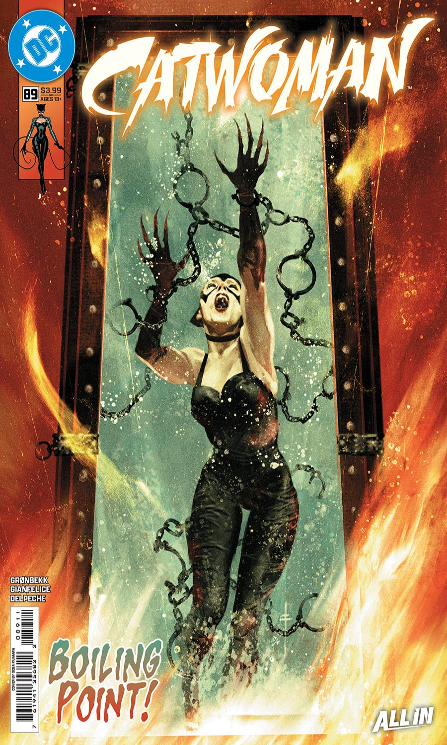 Comic book cover featuring a character in chains with flames and 'Catwoman' branding.