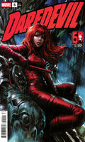 Marvel's Daredevil Variant Edition #5 comic book cover, featuring Matt Murdock as Daredevil in a red suit with long red hair, seated on a dark metallic structure in a rainy scene. The title 'DAREDEVIL' appears in large red letters across the top, with a '50 Years' logo in the upper right.