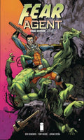 Comic book cover of 'Fear Agent' with a superhero and green alien-like creature.