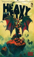 Cover of 'Heavy' magazine with a dragon and warrior illustration on a textured background.