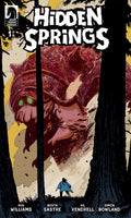 Comic book cover titled 'Hidden Springs' with a creature and person in a forest setting.
