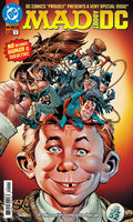 Comic book cover featuring a stylized illustration of a boy with superhero characters on his head, with 'Mad' and 'DC' branding.