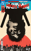 Comic book cover of Nightwing with a city skyline in the background