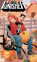 Comic book cover art for The Punisher, featuring the character seated in a chair among pumpkins and weapons, with the Marvel logo in the top right corner.