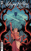Comic book cover featuring a woman with red hair and a hooded figure holding a sword, titled 'Sleepy Hollow'.