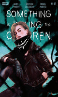 Comic book cover with a character wearing a black leather jacket and mask, against a green and black abstract background.