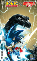 Comic book cover featuring Sonic the Hedgehog and Godzilla with dynamic poses and energy effects.
