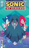 Comic book cover featuring Sonic the Hedgehog with a dark figure and crystals on a blue background