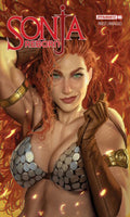 Comic book cover featuring a character with red hair and armor, with 'Sonja Reborn' and 'Dynamite' branding.