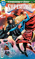 Kingdom of Zod #5 comic book cover featuring Supergirl in a blue and red costume flying forward, with Zod in black and a red cape behind her, and other DC Comics branding and issue text visible.