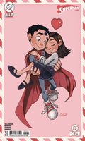 Comic book cover featuring a superhero character carrying a girl on a pink background with red heart and stripes.
