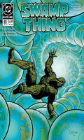 Comic book cover of 'Swamp Thing' with a character in a blue and green abstract background.