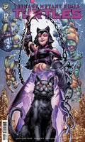 Comic book cover featuring a character with a black cat and Teenage Mutant Ninja Turtles in the background.