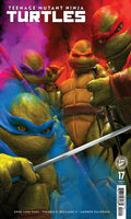 Comic book cover featuring Teenage Mutant Ninja Turtles with dynamic poses and vibrant colors.