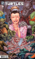 Comic book cover featuring Teenage Mutant Ninja Turtles with a woman and wolf in a medieval setting.