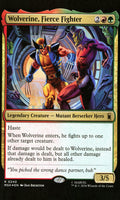 Trading card featuring Wolverine and a Berserker, with game text and artwork.
