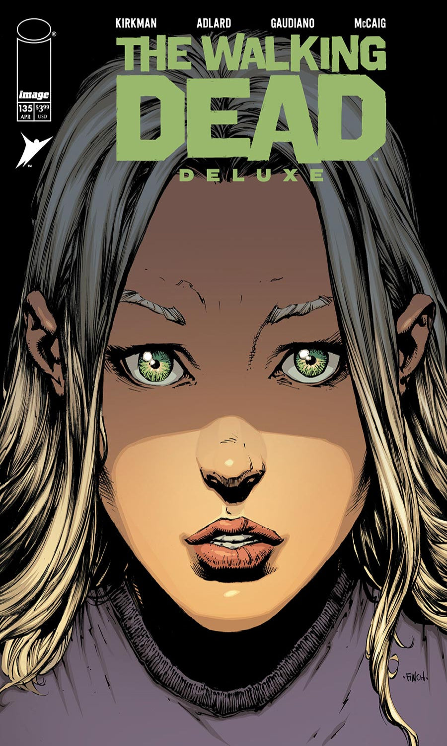 Comic book cover of 'The Walking Dead Deluxe' featuring a character with green eyes.
