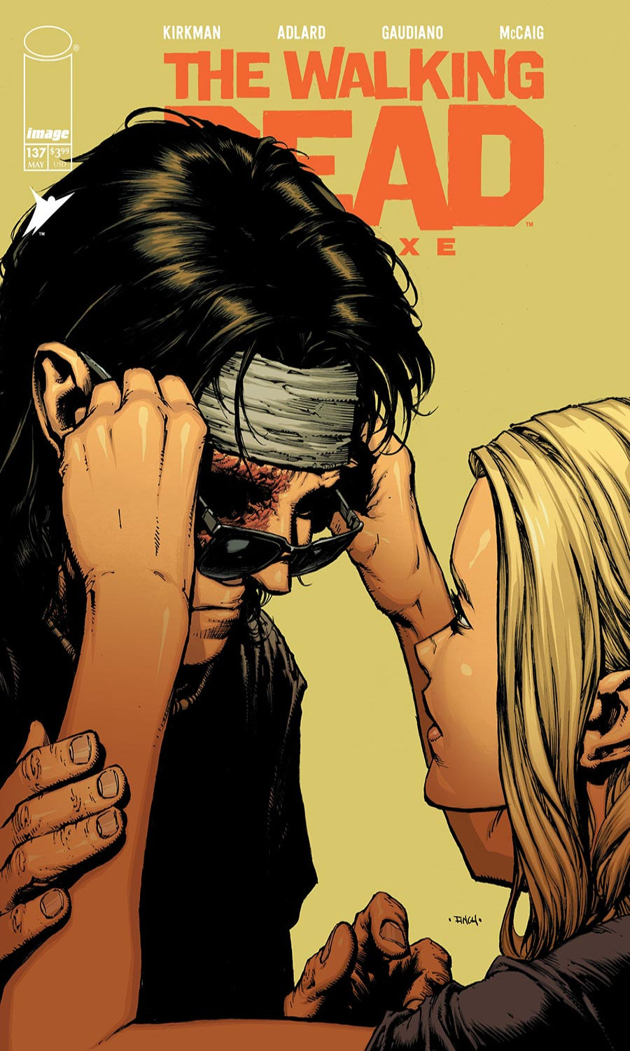Comic book cover of 'The Walking Dead' with a close-up of two characters on a beige background.