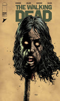 Comic book cover of 'The Walking Dead' with a zombie character on a beige background