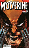 Comic book cover featuring Wolverine with a close-up of his face and claws.