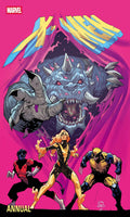 Marvel Annual cover with characters and a creature on a pink background