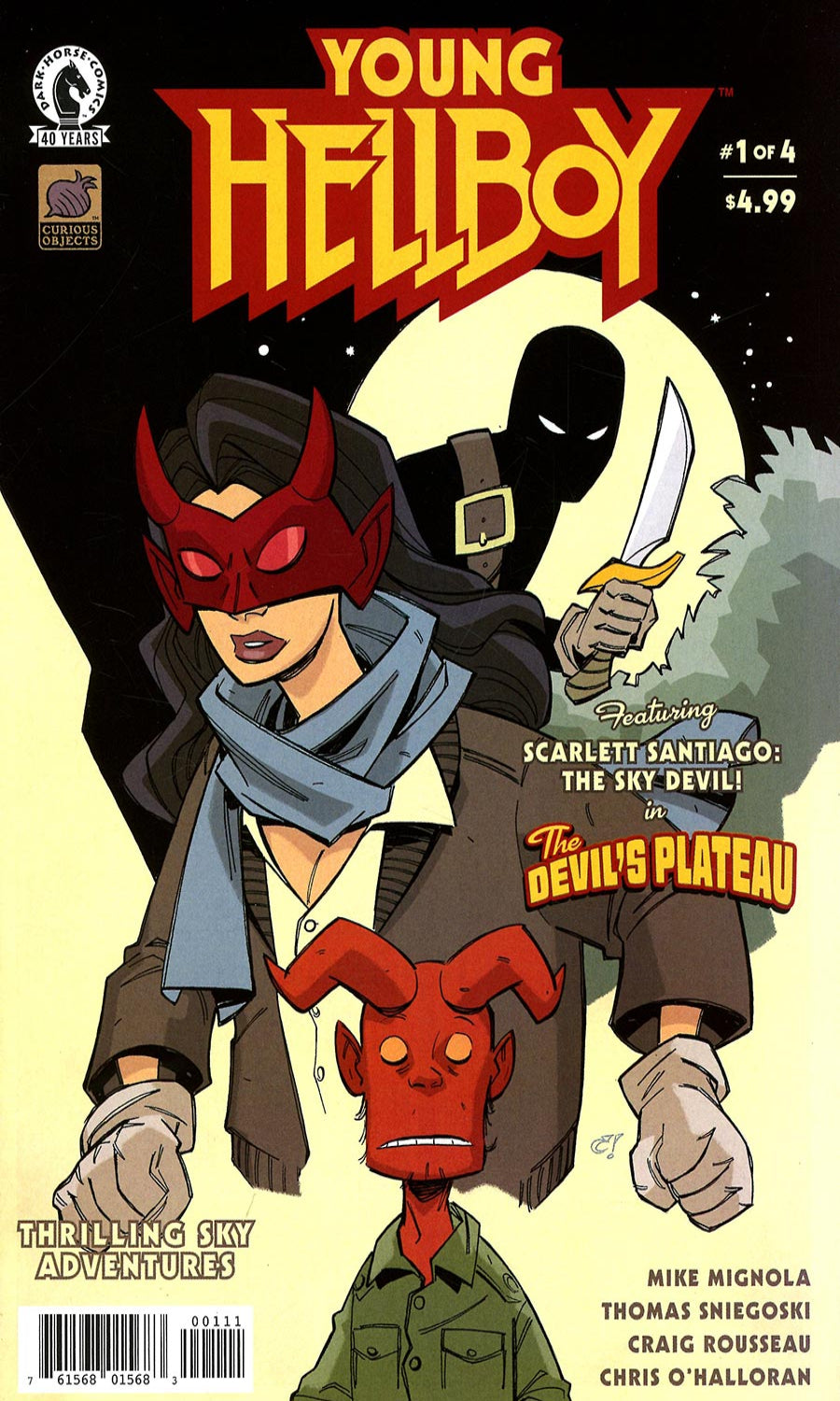 Comic book cover of 'Young Hellboy' featuring a character with a red mask and a small devil-like creature.